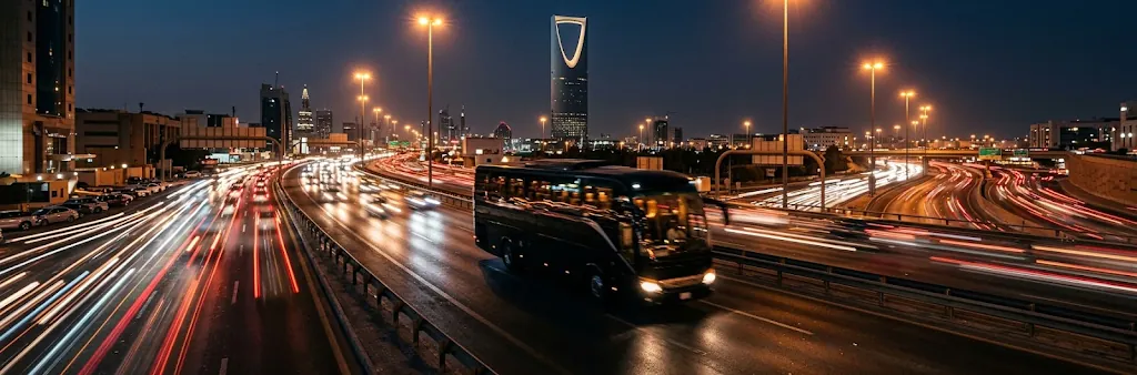 Coach driving through Riyadh at night